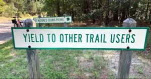 Yield on trail sign